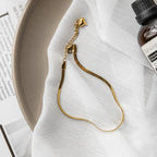 Bracelet de cheville en acier inoxydable plaqué or avec chaîne serpent – ​​Bijou tendance pour l'été et la plage pour femme
