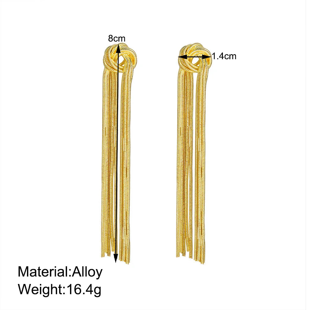 Pendientes llamativos con borlas doradas y brillantes: elegante diseño largo para mujer