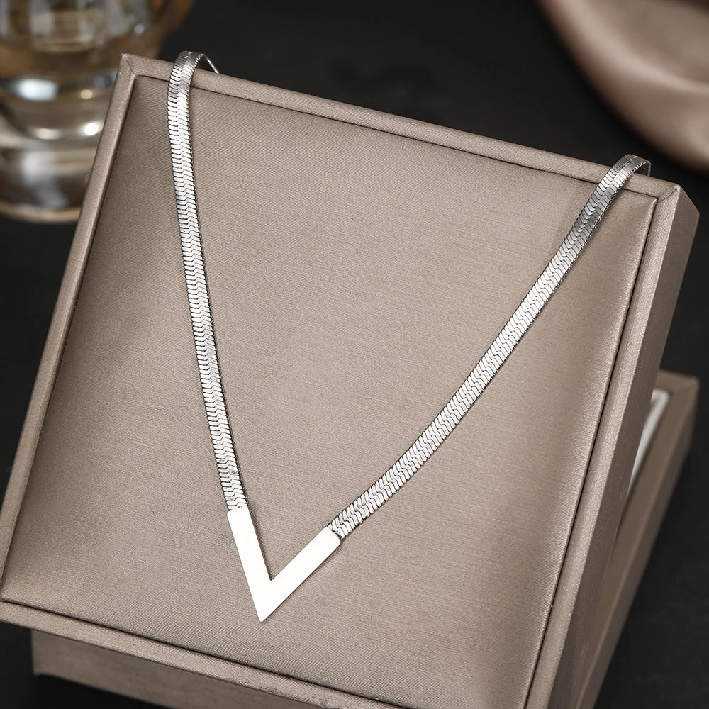 Collier pendentif géométrique en acier inoxydable – Bijou minimaliste unisexe pour hommes et femmes