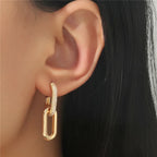 Pendientes de aro retro de doble bucle con diseño geométrico dorado y plateado.