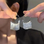 Pendientes largos de borlas de lujo exagerados: joyería llamativa con cadena geométrica dorada