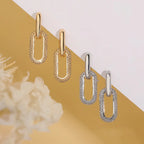 Pendientes de aro retro de doble bucle con diseño geométrico dorado y plateado.