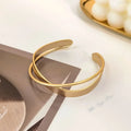 Pulsera Mobius de acero inoxidable chapada en oro: brazalete ajustable de lujo para mujer