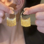 Pendientes largos de borlas de lujo exagerados: joyería llamativa con cadena geométrica dorada