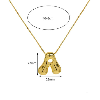 Golden Initial Necklace – Chunky Bubble Letter Pendant in Stainless Steel | Elariah Jewelry