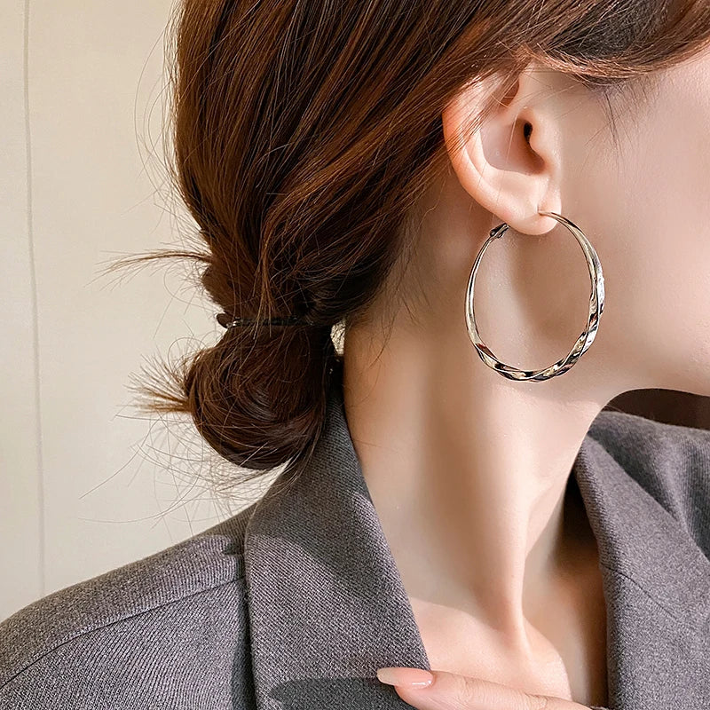 Mobius Twist Gold Hoop Earrings – Classic 50mm Statement Hoops for Women