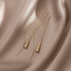 Boucles d'oreilles pendantes élégantes à longues pampilles et perles – Bijoux tendance en métal pour femmes