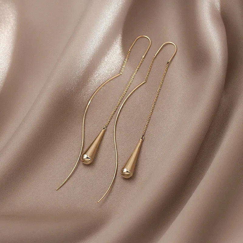Boucles d'oreilles pendantes élégantes à longues pampilles et perles – Bijoux tendance en métal pour femmes