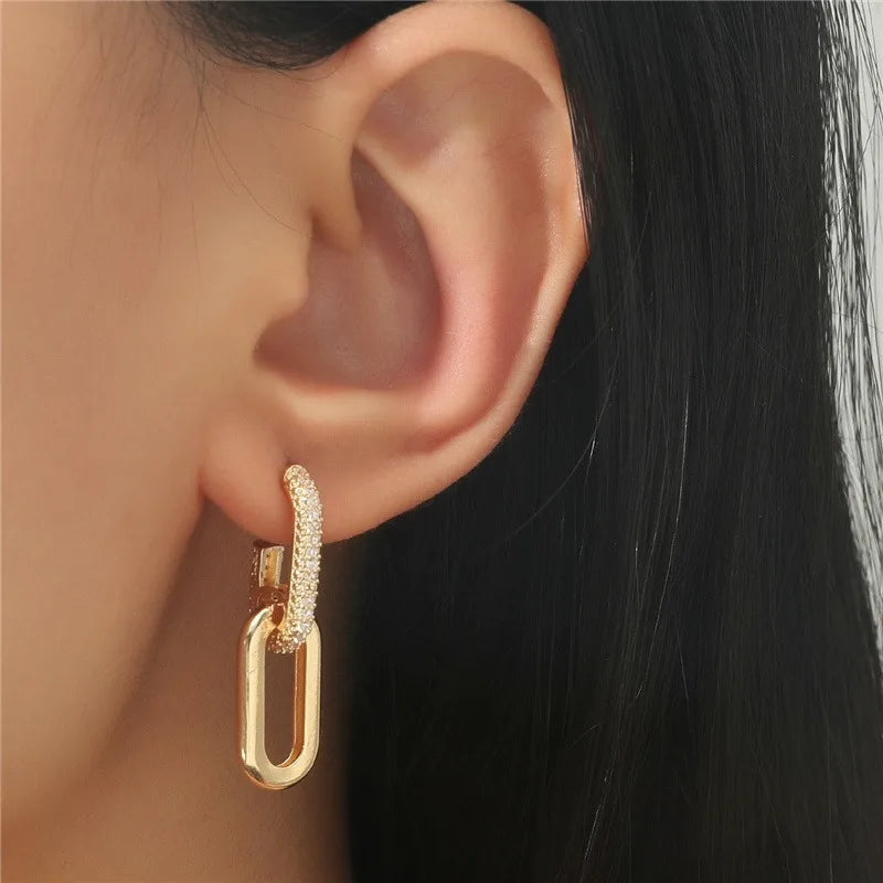 Pendientes de aro retro de doble bucle con diseño geométrico dorado y plateado.
