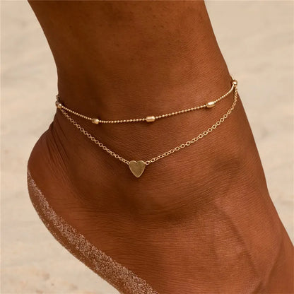 Elegant boho anklet with pearls and shell charm – perfect for beach, weddings, and everyday style.