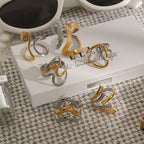 Anillo minimalista irregular de dos tonos: acero inoxidable chapado en oro de 18 quilates, joyería apilable para mujer.