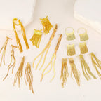 Pendientes llamativos con borlas doradas y brillantes: elegante diseño largo para mujer
