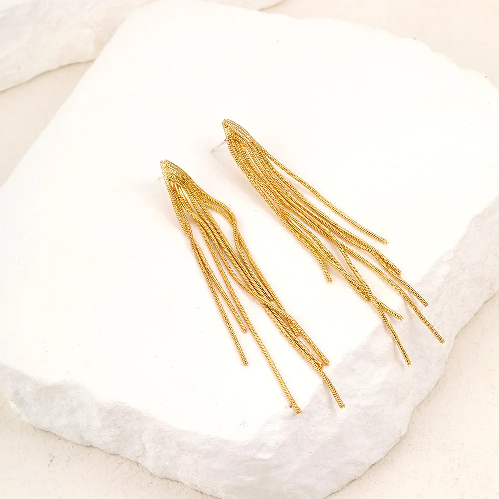 Pendientes llamativos con borlas doradas y brillantes: elegante diseño largo para mujer