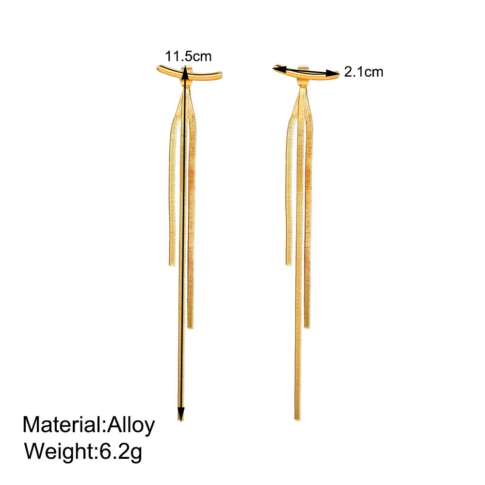 Pendientes llamativos con borlas doradas y brillantes: elegante diseño largo para mujer