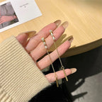 Boucles d'oreilles pendantes élégantes à longues pampilles et perles – Bijoux tendance en métal pour femmes