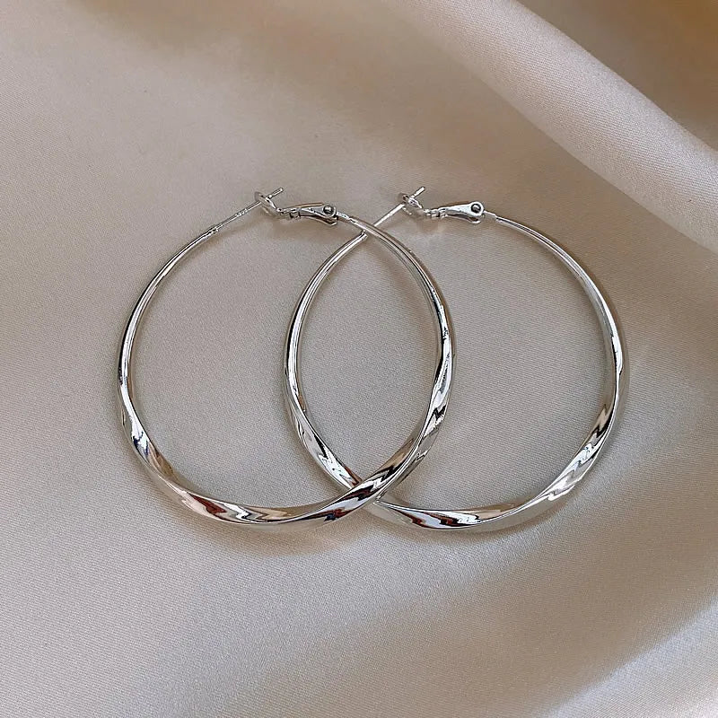 Mobius Twist Gold Hoop Earrings – Classic 50mm Statement Hoops for Women