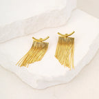Pendientes llamativos con borlas doradas y brillantes: elegante diseño largo para mujer