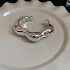 Brazalete trenzado geométrico irregular: pulsera vintage con estilo para mujer