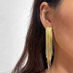 Pendientes llamativos con borlas doradas y brillantes: elegante diseño largo para mujer
