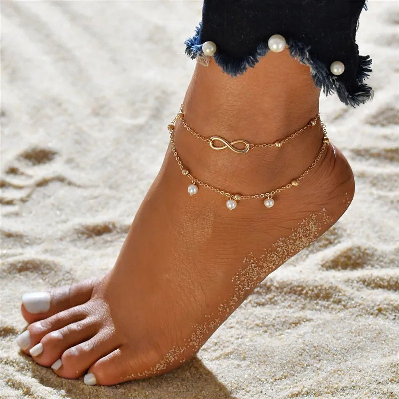 Elegant boho anklet with pearls and shell charm – perfect for beach, weddings, and everyday style.