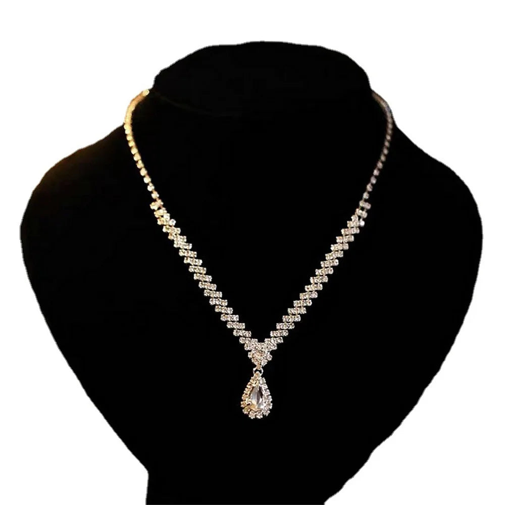 Ensemble luxueux collier et boucles d'oreilles goutte d'eau en cristal – Bijoux de mariée et de fête élégants