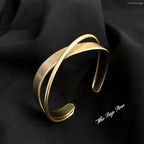 Pulsera Mobius de acero inoxidable chapada en oro: brazalete ajustable de lujo para mujer