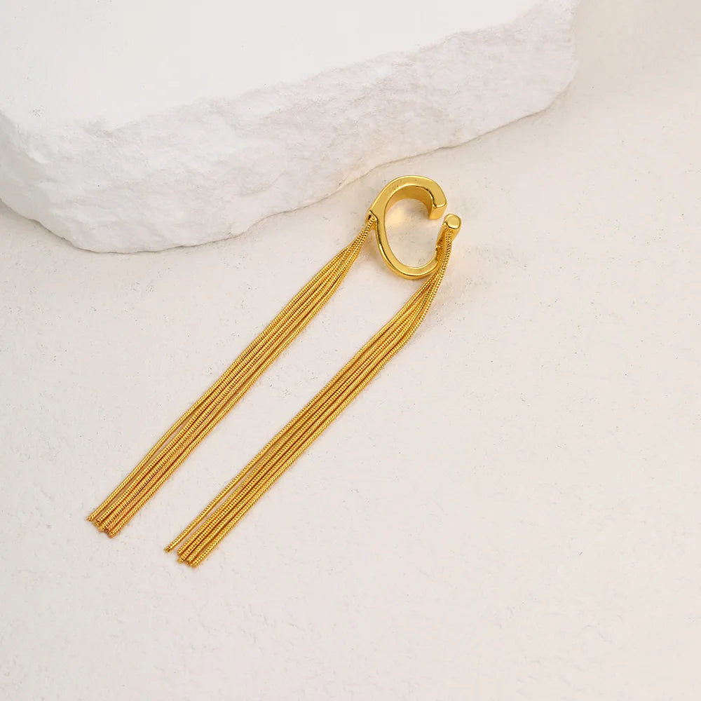 Pendientes llamativos con borlas doradas y brillantes: elegante diseño largo para mujer