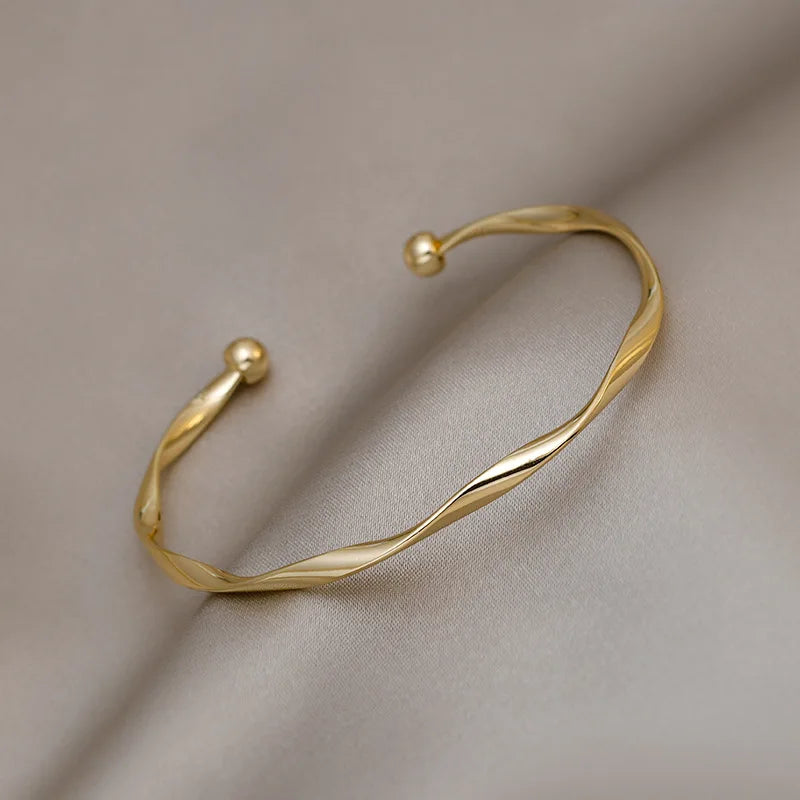 Bracelet jonc minimaliste torsadé en or pour femme – Bijou jonc ouvert élégant