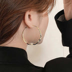 Aros dorados Mobius Twist: aros clásicos de 50 mm para mujer