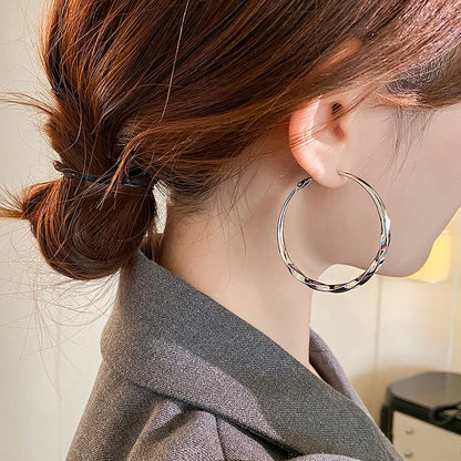 Mobius Twist Gold Hoop Earrings – Classic 50mm Statement Hoops for Women