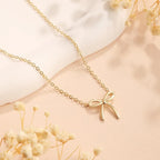 Collar con colgante de lazo delicado: gargantilla chapada en oro y plata para mujer